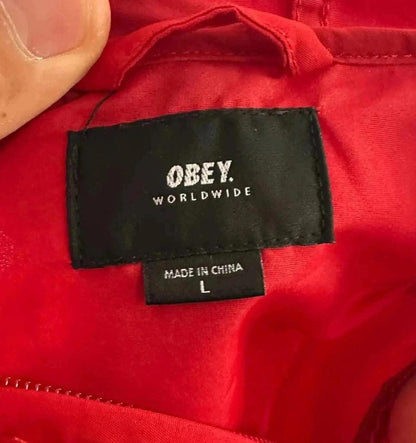 💎 Imperméable Rouge Obey taille L - 100% Polyester 💎