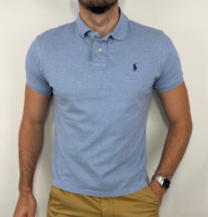 Polo Ralph Lauren homme taille S en très bon état. Pièce seconde main premium sélectionnée par Comptoir Masculin. Expédition rapide depuis la France.