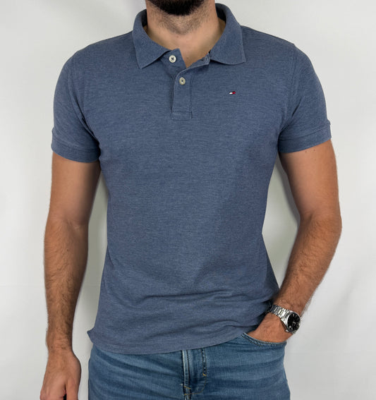 Polo Tommy Hilfiger homme taille S en très bon état. Pièce seconde main premium sélectionnée par Comptoir Masculin. Expédition rapide depuis la France.