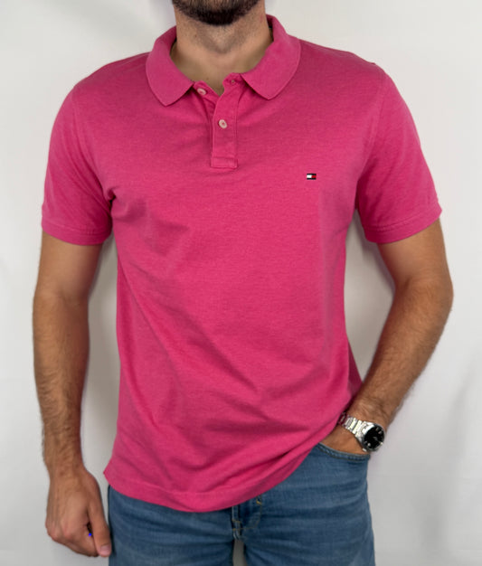 Polo Tommy Hilfiger homme taille L en très bon état. Pièce seconde main premium sélectionnée par Comptoir Masculin. Expédition rapide depuis la France.