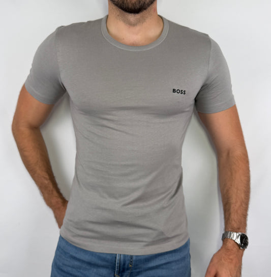 T-shirt Hugo Boss homme taille S en parfait état. Pièce seconde main premium sélectionnée par Comptoir Masculin. Expédition rapide depuis la France.